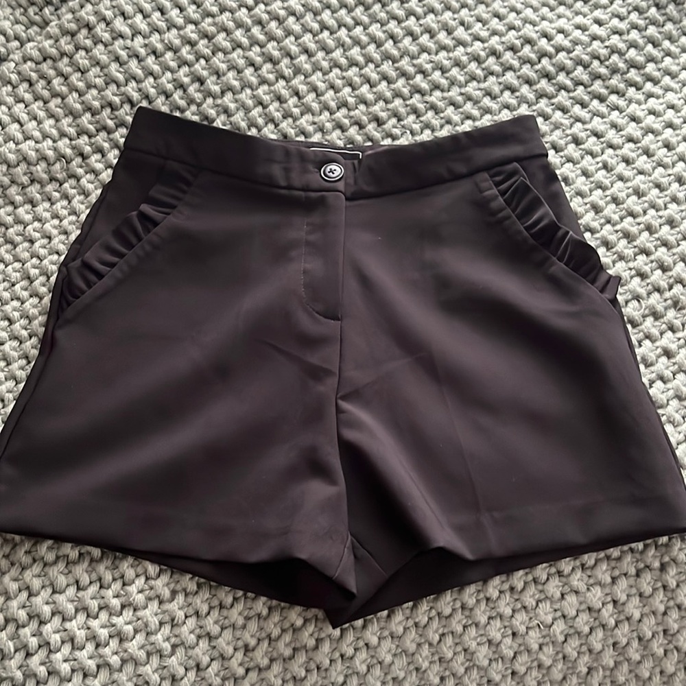 HAVE.. black dress pixie shorts with ruffles.